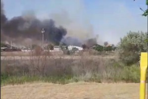 Пожар на Аксарайском шоссе распространился на 25 километров