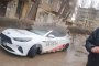 В Астрахани огромное дерево свалилось на машину